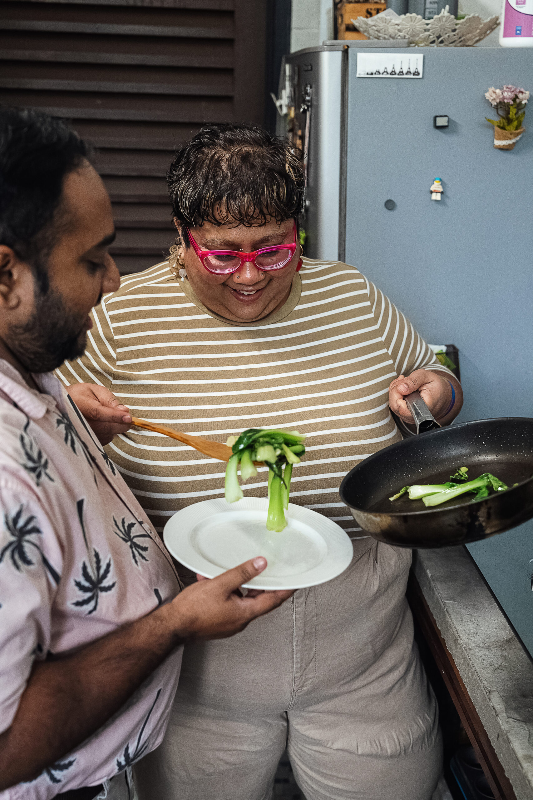 Couple cooking in kitchen