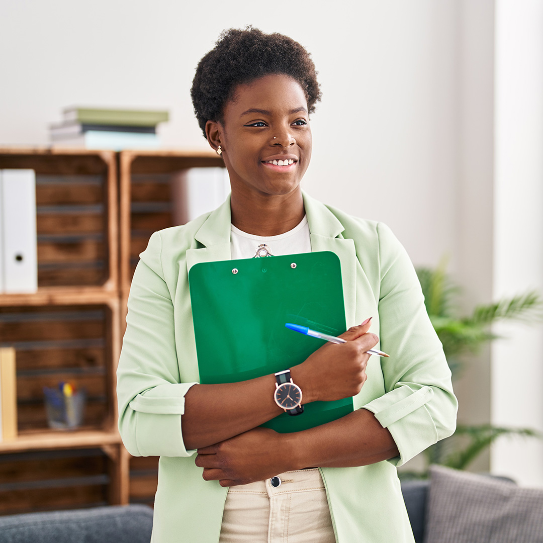 Image of woman holding a clipboard